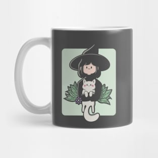 girl hugging a cat Mug